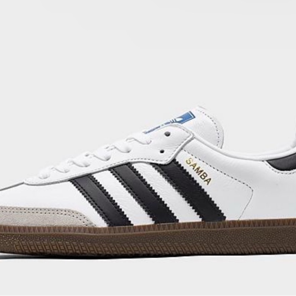 Adidas White and Black Sneakers with Signature Stripes